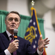 U.S. Sen. David Purdue (R-Ga.) speaks to the crowd of supporters during a “Defend the Majority” rally at the Georgia National Fairgrounds and Agriculture Center on November 19, 2020 in Perry, Georgia. Purdue is facing Democratic U.S. Senate candidate Jon Ossoff in a January 5th runoff race.